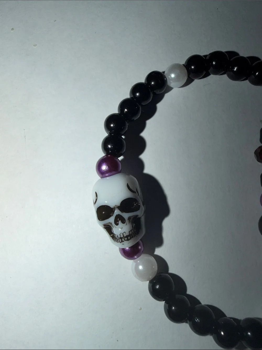 Edgy Black and Purple Beaded Skull Stretch Bracelet Set